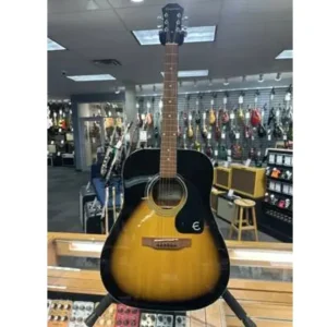 Epiphone acoustic guitar with a sunburst finish on a stand in a music store